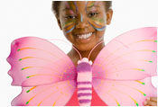 child with face painting and costume to look like a butterfly