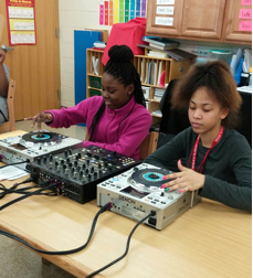 X-STEAM Students working with DJ equipment