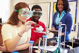 Teacher and students in a science lab