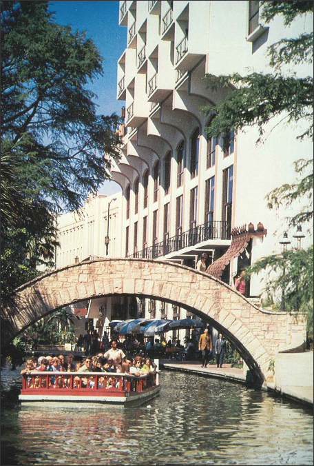 A photo showing the San Antonio riverwalk.