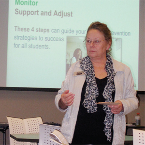 Photo of Ann Neeley showing Texas educators how to use student data.