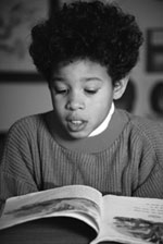 Picture of young boy reading